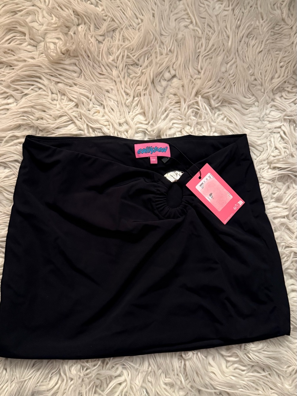 Black mini skirt ring detail